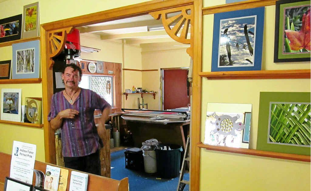 New owner of Gold Town Framing, Burnie Clifford, inside his studio/gallery/workshop at Groundwater Rd on Gympie’s Southside. New owner of Gold Town Framing, Burnie Clifford, inside his studio/gallery/workshop at Groundwater Rd on Gympie’s Southside.